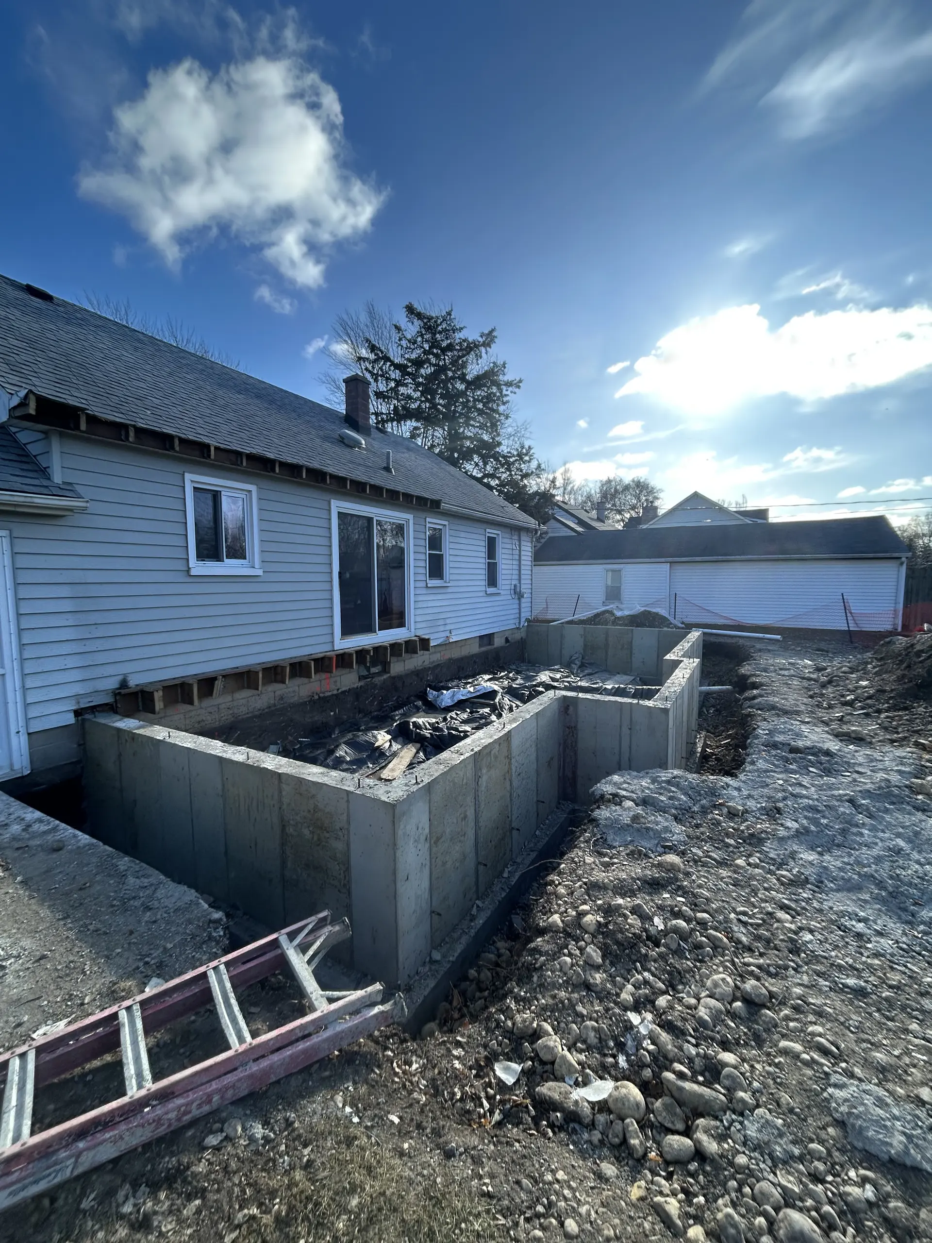 Poured concrete steps and stoop